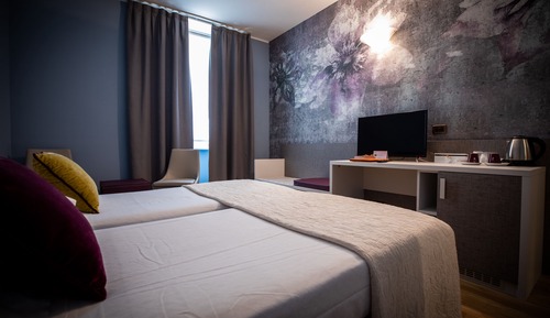 Habitación cuádruple Deluxe