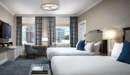 Suite ejecutiva, 2 camas de matrimonio, vistas a la ciudad