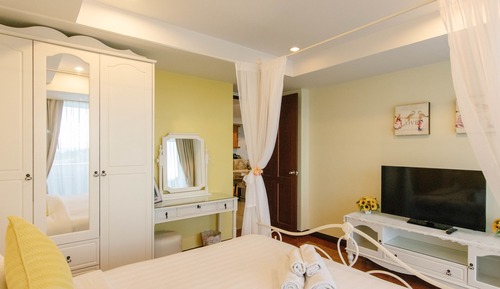 Suite Deluxe, 3 habitaciones, cocina básica, vistas parciales al mar