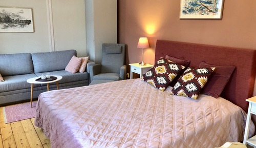 Habitación cuádruple clásica, 1 cama doble con sofá cama, vistas al jardín