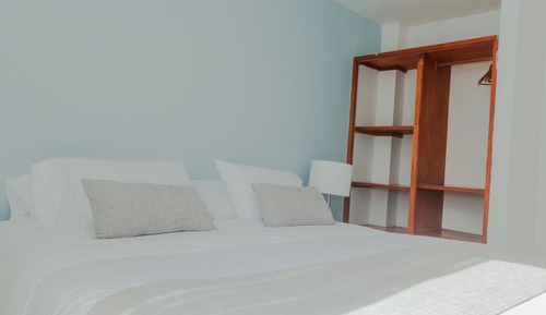 Habitación cuádruple familiar, varias camas, vistas al mar