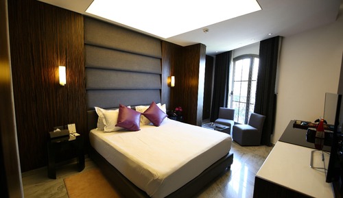Habitación de lujo, 1 cama de matrimonio grande, vistas parciales al mar