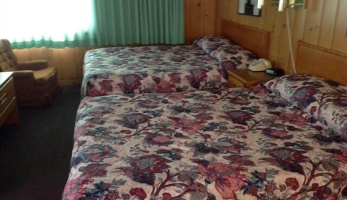 Habitación triple, varias camas