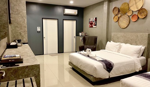 Habitación triple Deluxe