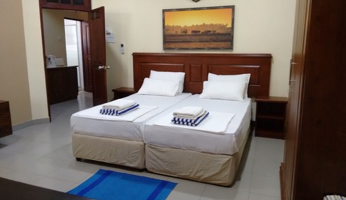 Habitación Deluxe con 2 camas individuales, balcón, vistas al mar