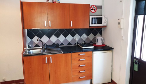 Suite Deluxe, varias camas, cocina básica