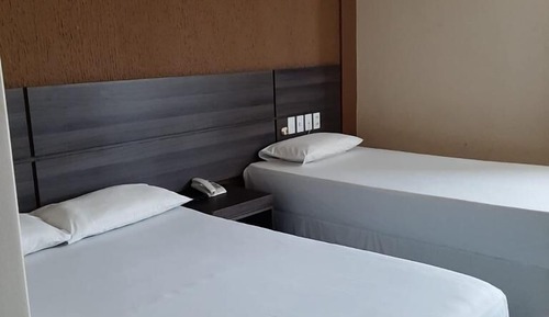 Habitación Deluxe, varias camas, baño privado