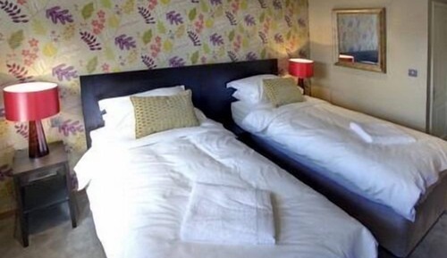 Habitación estándar con 1 cama doble o 2 individuales, baño privado
