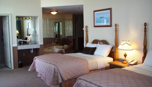 Habitación superior, 2 camas de matrimonio, bañera de hidromasaje, vistas al puerto deportivo