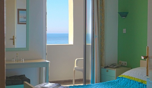 Habitación triple, vistas al mar