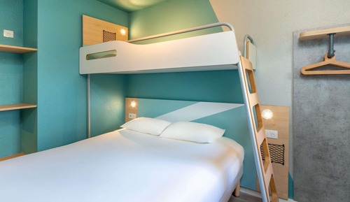 Habitación triple, varias camas
