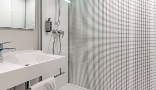 Habitación triple, varias camas