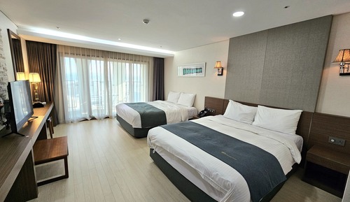 Habitación familiar con 2 camas individuales