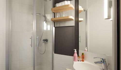 Habitación triple, varias camas