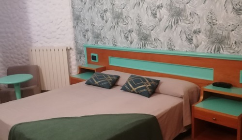 Habitación estándar con 1 cama doble o 2 individuales