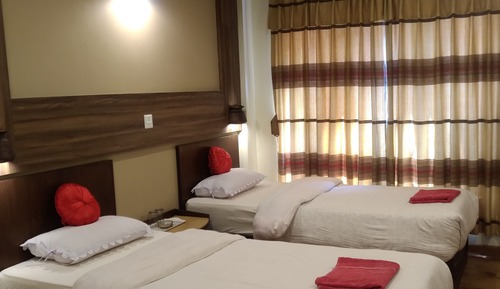 Habitación estándar con 1 cama doble o 2 individuales