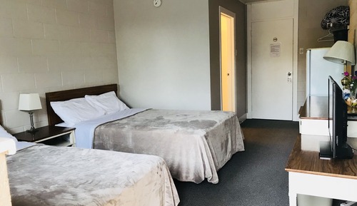 Habitación estándar con 1 cama doble o 2 individuales, 2 camas dobles
