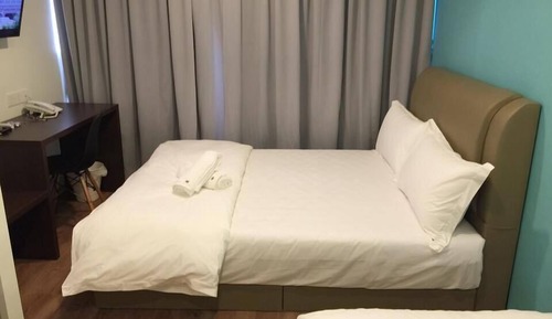 Habitación triple Deluxe