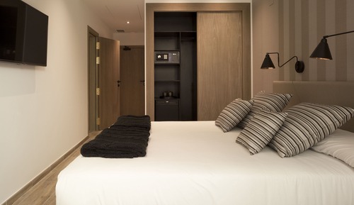 Habitación Premium con 1 cama doble o 2 individuales, patio privado o compartido