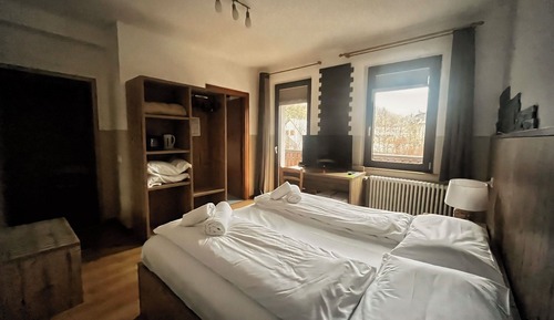 Habitación Confort con 1 cama doble o 2 individuales