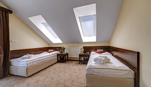 Habitación Confort con 1 cama doble o 2 individuales