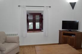 Villanueva del Fresno Apartamento | Cuarto del Naranjo. 36 m2.