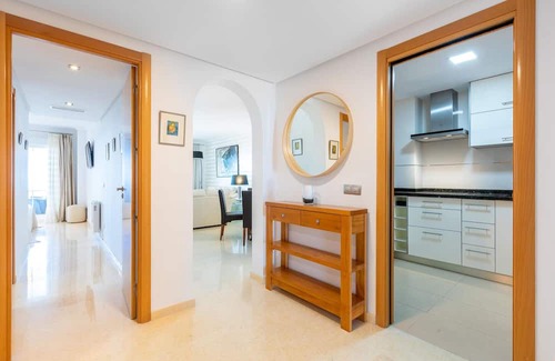 Rincon de la Victoria Apartamento | Comfortable, attractively located vacation home with shared pool and panoramic sea views.
