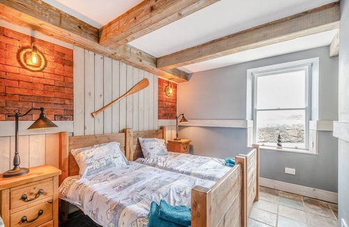 Dunure Cabaña | The Harbour Nook is a gorgeous ground floor, coastal apartment situated at the harbour’s edge with l