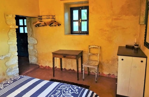 Faistos Casa | Original, Cretan stone house with a view of the enchanting garden