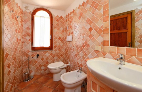 Trinita d'Agultu e Vignola Apartamento | Nice apartment for 5 guests with TV, terrace and pets allowed