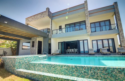 Tower Isle Villa | Luxury Oceanfront Villa Fully Staffed