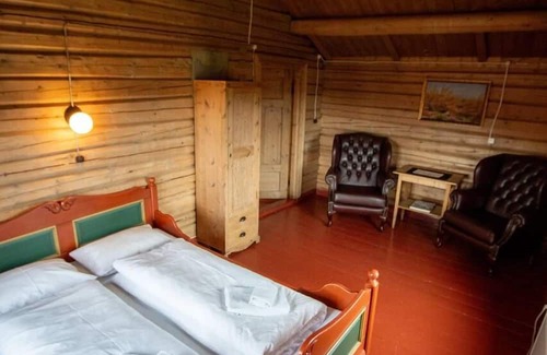 Ringebu Hotel | Skotten Seter Bed Husky