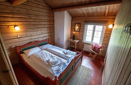 Ringebu Hotel | Skotten Seter Bed Husky