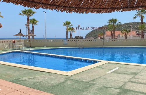 Puerto de Mazarron Apartamento | Accessible apartment 50 metres to beach ,large communal pool, sea view balcony