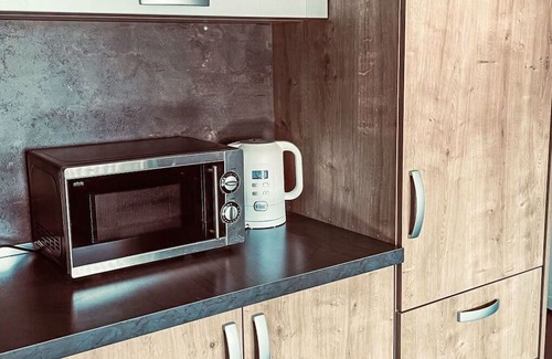 Steinberg am Rofan Apartamento | Lovely apartment for 14 people with WIFI, hot tub, patio and parking