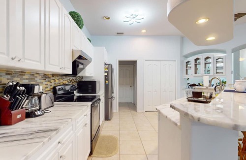 Port Charlotte Casa | Dog friendly house with private pool, lanai, and internet