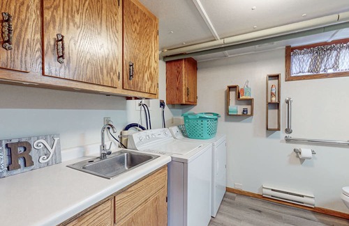 Hazelhurst Casa | Lakefront home with large patio, fire pit, air hockey & a provided peddle boat