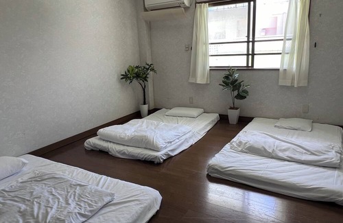 Taketomi-jima Taketomi-cho Apartamento | Ishigakijima Group Inn 2216 Nijiiro in Euglena Mall