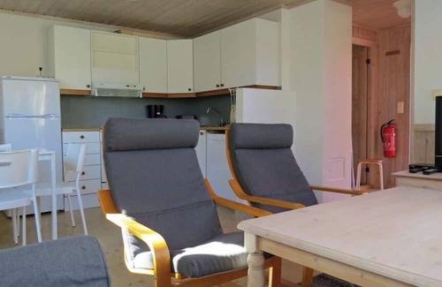 Spangereid Casa | Holiday home "Ramsland Brygge 5", on the fjord Ramslandsvågen near Ramsland, Spangereid-Lindesnes, southern Norway, max 4 adults child, 2 bedrooms, 1 bathroom, boat mooring at the jetty in front of the house, terrace at the house, final cleaning .