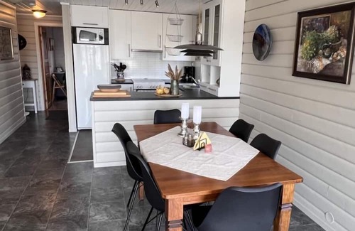 Lindesnes Casa | Holiday home Mona in Lussevika, new addition 2024, near Spangereid-Lindesnes, southern Norway, , max. 6 adults, own boat mooring, approx. 100 m² living space, 3 bedrooms, charming and tasteful furnishings, large veranda with fjord view, terrace f.