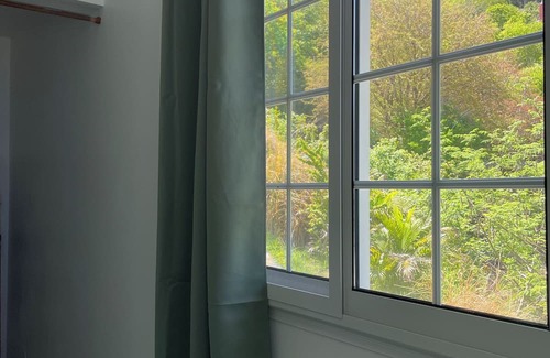 Les Anses-d'Arlets Apartamento | "Sweet bamboo" bottom of villa, sea view, 2 minutes from the beach