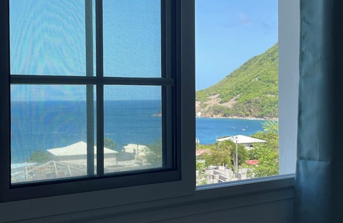 Les Anses-d'Arlets Apartamento | "Sweet bamboo" bottom of villa, sea view, 2 minutes from the beach