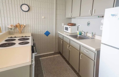 Punaluu Apartamento | Palm Beachfront | Amazing view, Pool, beach gear