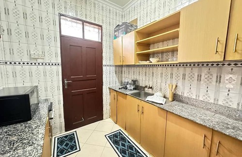 Dar es Salaam Casa | Unmatched Convenience: The Brownstone Provides Easy Access to Evrything You Need