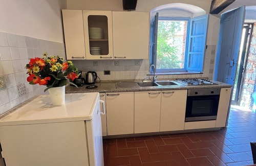 Pieve a Presciano Casa | Casa Intera in Pietra in Toscana