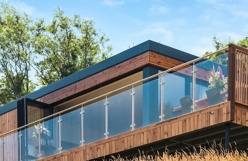 Chittlehamholt Cabina | Discover the epitome of relaxation in the Valley View 3 Bed Lodge, where panoramic views and modern