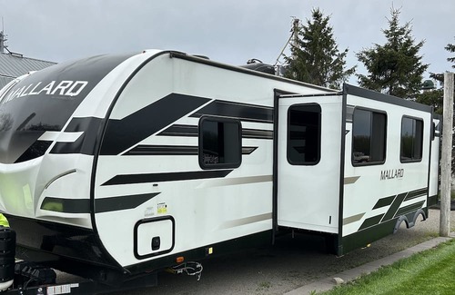 Mosinee Casa | Waterside Campsite with camper. Pet friendly!