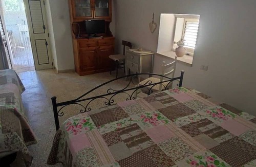 Posto Vecchio Apartamento | Apartment 'Trullo' with Private Terrace, Private Garden and Air Conditioning