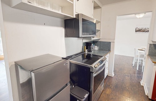 Shoreline Casa | Dog-friendly lake view getaway with a full kitchen, sunroom, fireplace
