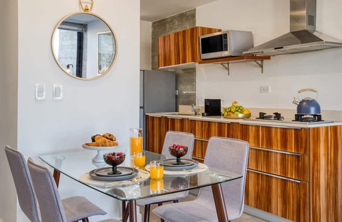 Avenida Revolucion Apartamento | Amazing Apt w/a Pvt Balcony: Lounge-B/Center+Gym